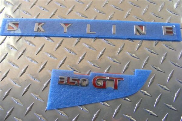 Trunk Emblem - Nissan Skyline V35